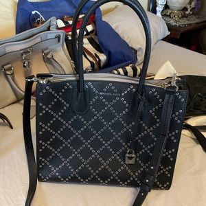 Micheal kors Mercer stud and grommet.